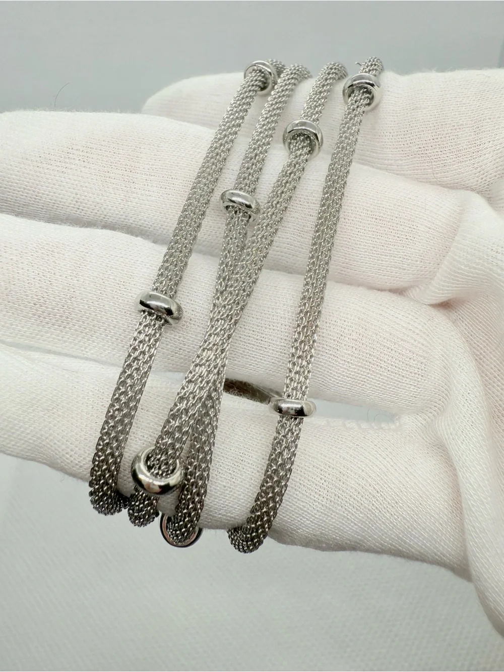 Anne Klein Silver Layered Mesh Bracelet with Polished Rings